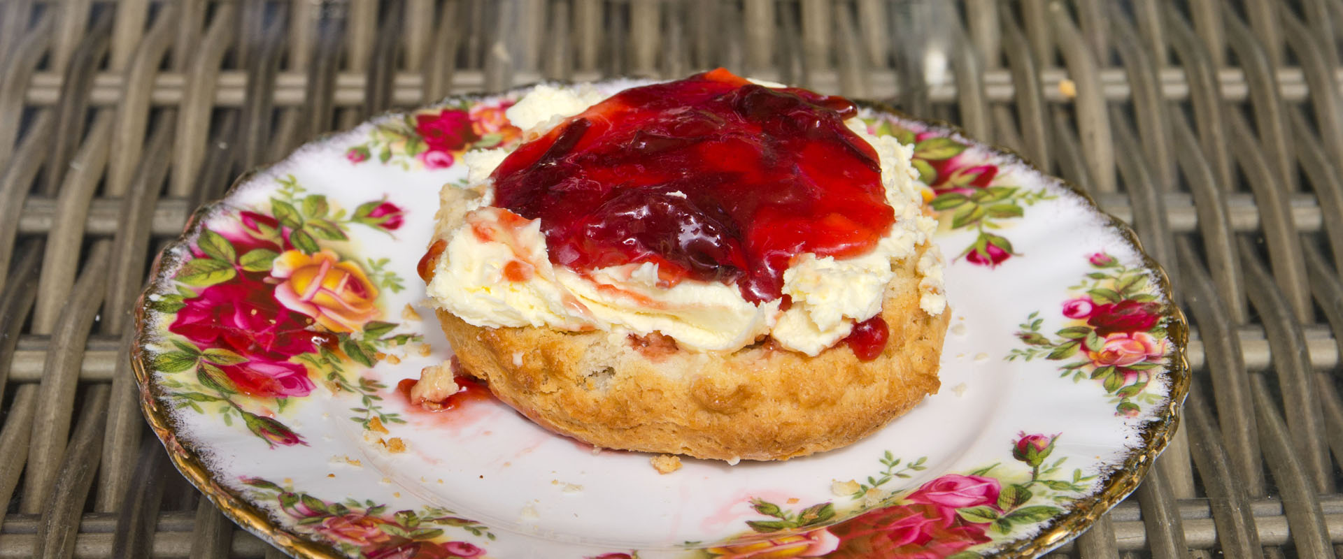Scone with cream then jam on top