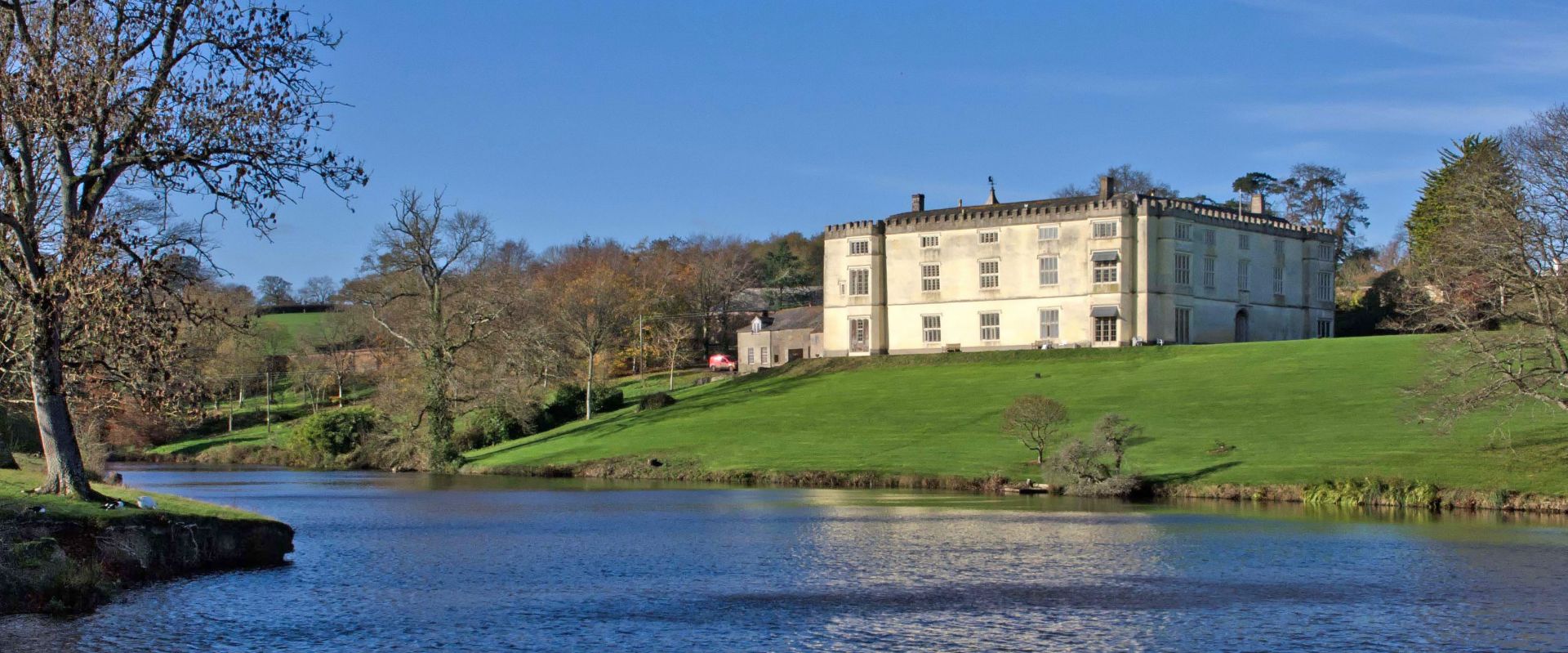 The lake and house at Great Fulford