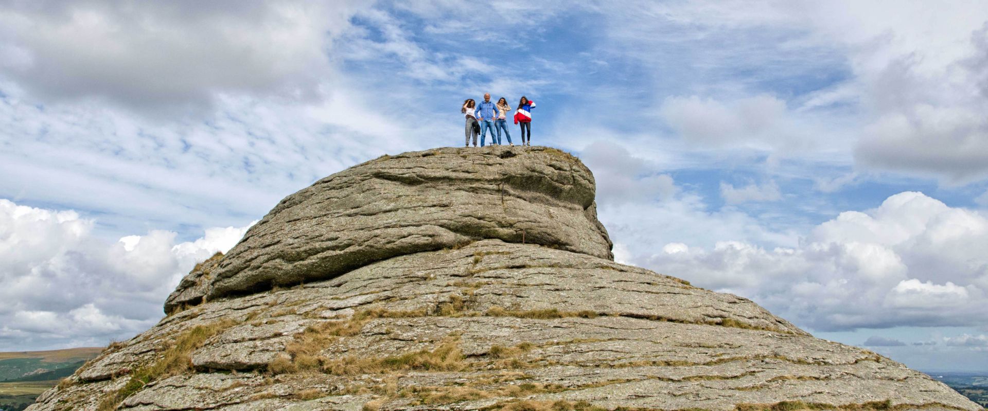 Guests standing on top of Haytor